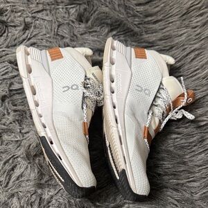 On Running Athletic Shoes in White and Tan